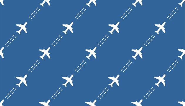Beautiful seamless pattern of white airplane silhouettes with dotted flight trails on a solid dark blue background.
