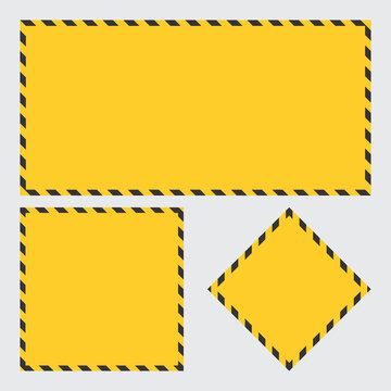Yellow construction warning frames set with black stripes isolated on grey background