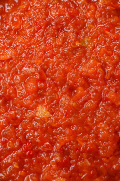 Red tomato Bolognese sauce with spices, salt, pepper, and herbs. A red sauce