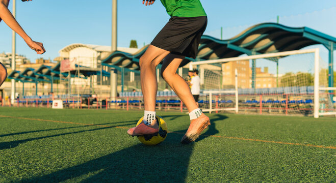 Soccer player controlling the ball during training