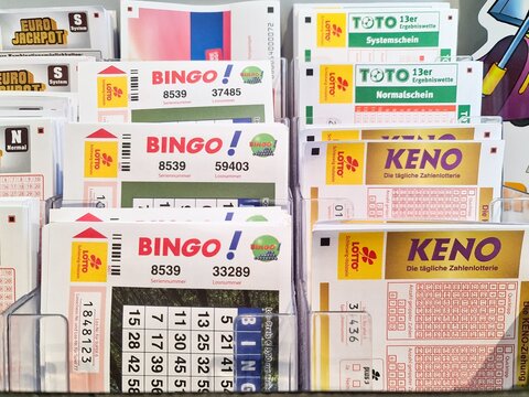Hamburg, Germany - 06. June 2026: Lottery tickets and gambling forms offering chance to win