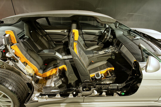 Car cross section view showing interior layout, leather seats mechanism and chassis structure