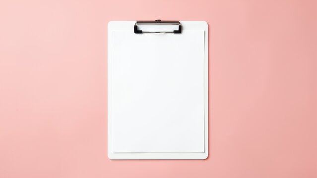 overhead flat lay blank clipboard paper on pastel blush pink background for planning productivity mockups fresh clean organization concept