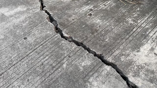 Severe Crack and Fracture on Concrete Road Surface