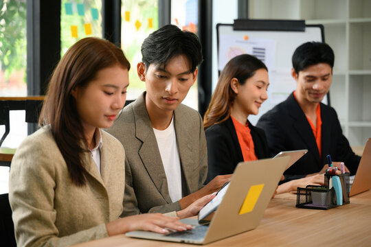 Executive HR Consultant Team Preparing New Employee Interviews at Office Meeting Table with Laptops