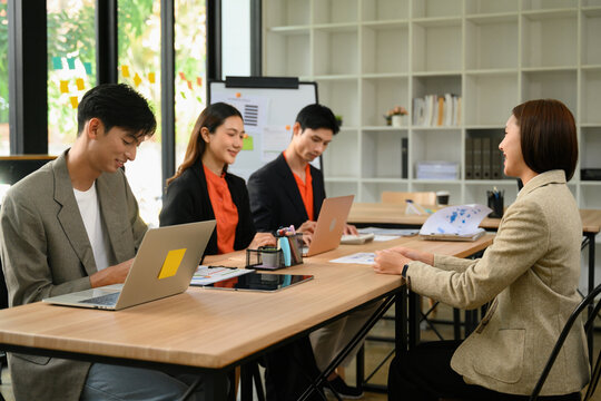 Executive Board Conducting New Employee Interview with HR Panel in Modern Office Meeting Room