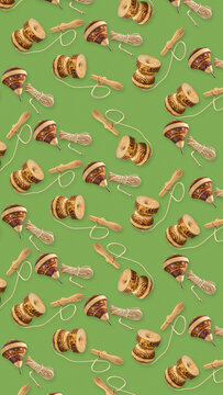 Chilean patriotic celebration 8K vertical background 9:16 for mobile wallpapers with seamless pattern of traditional wooden emboque and whipping top toys on green backdrop