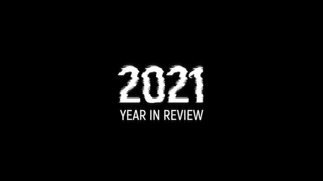 2021 year in review text glitch animation black background. recap rewind end video 2021 year in review for annual busines
