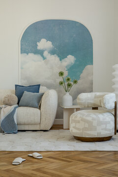 Inviting Living Room with Modern Furniture and Serene Cloud Mural Decor in a Cozy Home Interior