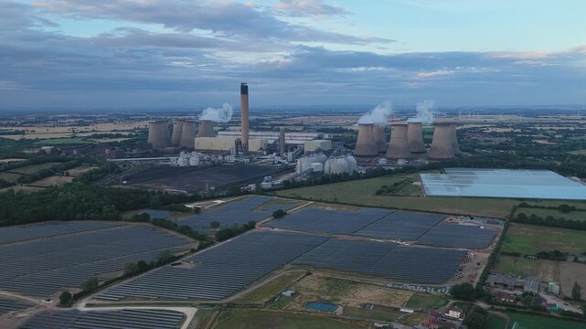 Thermal Power Plant and Solar Farm Coexist in Rural England