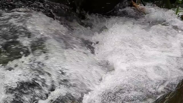 water flowing over rocks