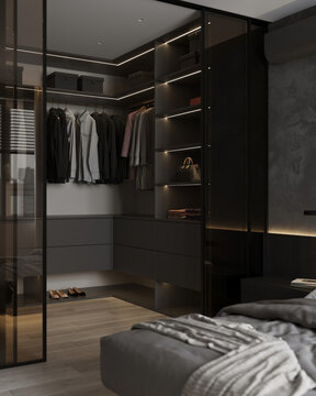 Luxury walk-in closet with custom dark cabinetry, integrated lighting, and contemporary bedroom interior