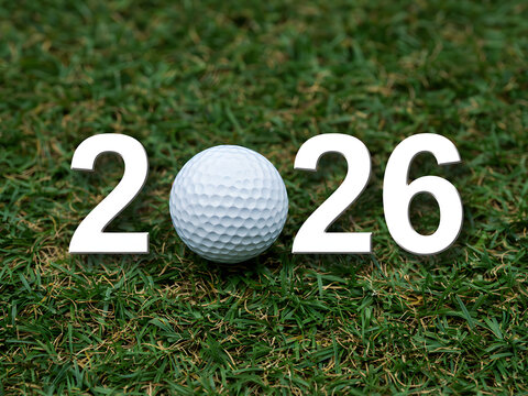 Golf ball on green grass with 2026 text, golfing and new year concept
