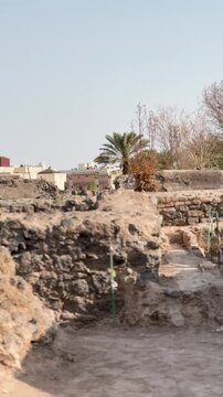 Ancient stone walls and archaeological ruins at the historic othman well site.