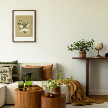Inviting Living Room with Earthy Home Decor, Cozy Sofa, Wood Side Tables, and Green Plants