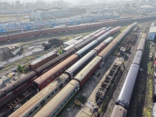 Aerial view of trains parked in rail yard depot © GoAerials