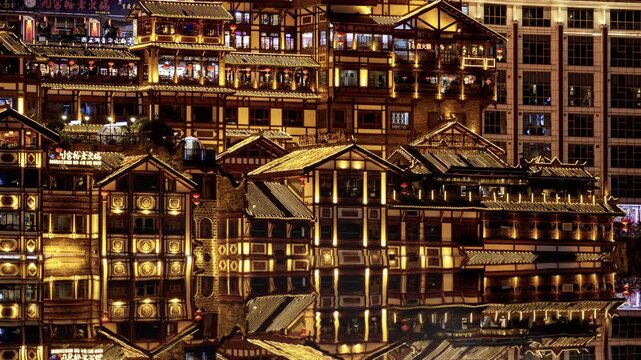 Chongqing cyberpunk city skyline illuminated at night reflected in water