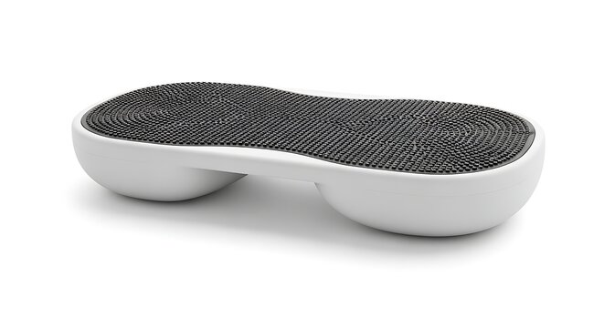 A white and black insole with a unique design is displayed on a plain surface.
