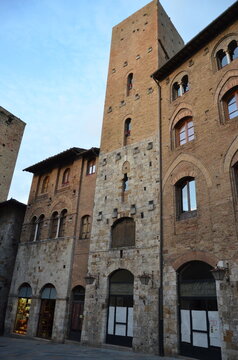 San Gimignano, Italy 03.04.2020: Town Hall (also known as the Palazzo del Popolo or Palazzo Nuovo del Podest&agrave;) and the Torre Grossa in San Gimignano
