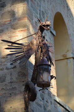 Castiglioncello, Italy 03.04.2020: Dragon-shaped sample holder or artistic lamp located at the Pasquini Castle in Castiglioncello.