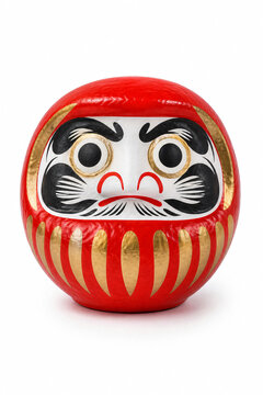 Red daruma doll on white background traditional Japanese lucky charm