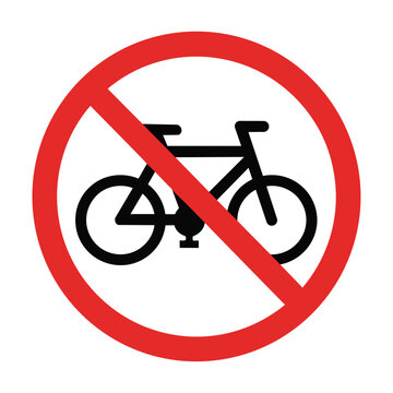 Red prohibition sign with a black bicycle silhouette isolated on white for urban traffic and safety regulations Urban safety and regulation concept