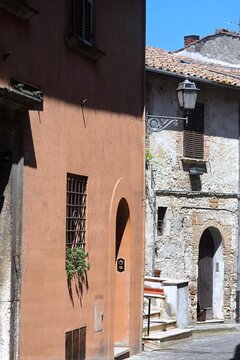 Charming stone alleyway in the medieval historic town of Narni, Italy.