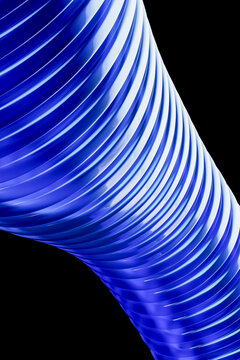 3D cobalt spiral ribbon curves across a deep black background