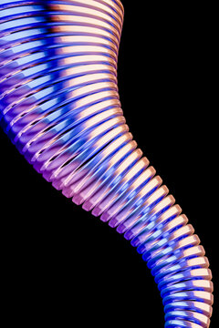 3D iridescent coil form glows against a clean black backdrop