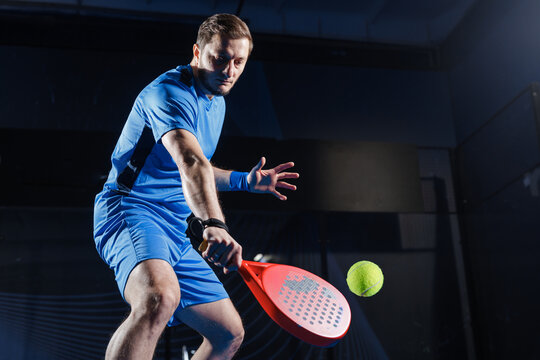 Padel Tennis Training Session with Racket and Ball in Indoor Court