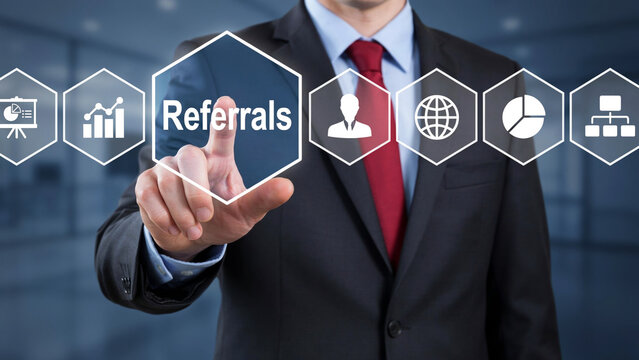 A professional business person interacting with a digital interface to select a customer referral strategy for increasing company growth with referrals futuristic touchscreen