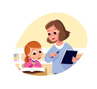 Teacher with a textbook in her hands stands near student girl, student listens attentively at teacher, listens to the lecture, lesson and writes in workbook. 