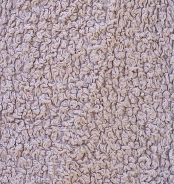 Detailed macro shot of soft off-white cotton fabric