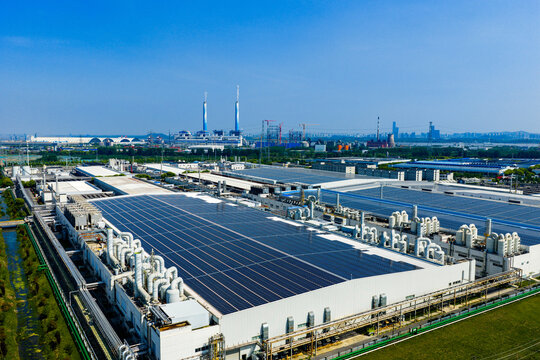 large solar-powered factory complex in urban fringe
