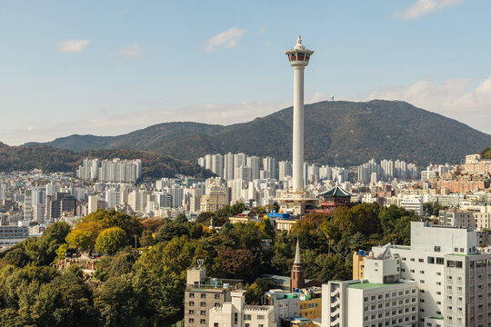 Busan Tower and City Skyline With Mountains