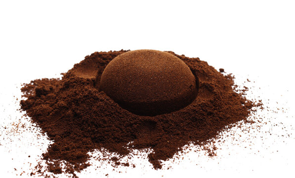 Milled coffee powder pile for espresso, ground isolated on white background, side view