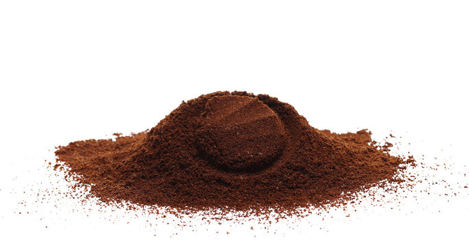 Milled coffee powder pile for espresso, ground isolated on white background, side view