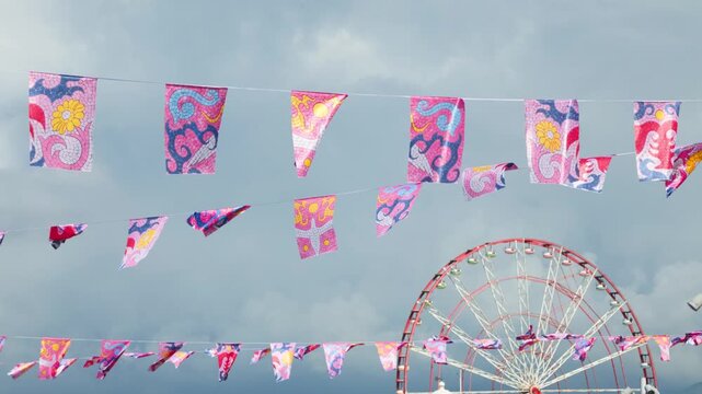 Festive decorative bunting flags with a Ferris wheel