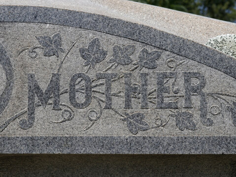 Close up of Historic Headstone With Word Mother