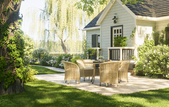 Cozy white cottage house surrounded by lush green forest garden