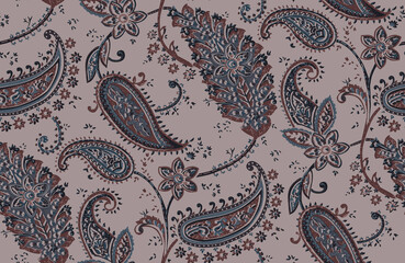 Seamless repeating pattern with paisley motifs placed at different angles, balanced by smaller floral elements and filler © Venkatsai