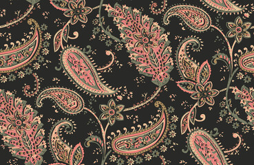 Seamless repeating pattern with paisley motifs placed at different angles, balanced by smaller floral elements and filler © Venkatsai