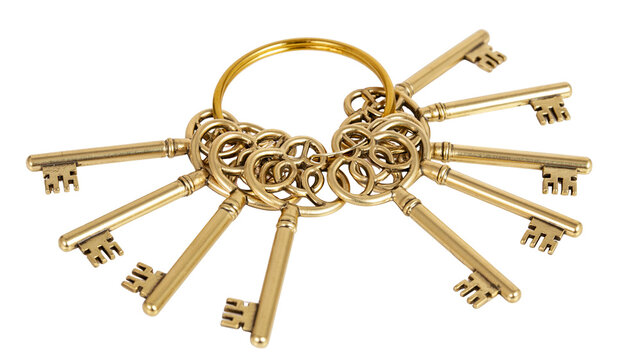 Ornate antique brass keys on a golden ring, isolated on transparent background