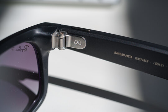 Dusseldorf, Germany - July 9 2026: Close view of Ray-Ban Meta smart glasses hinge with Meta branding and premium finish