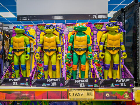 Italy - July  10, 2026: Retail display of Teenage Mutant Ninja Turtles Mutant Mayhem Mutant XL action figures on a toy shop shelf, with a price tag