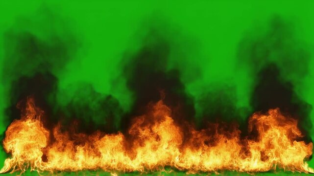 Raging fire elements with smoke rising in a seamless loop against a green screen background for visual effects