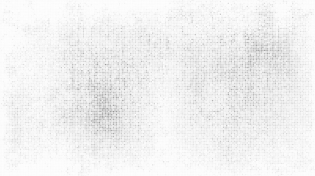 A halftone pattern with small black dots on white background