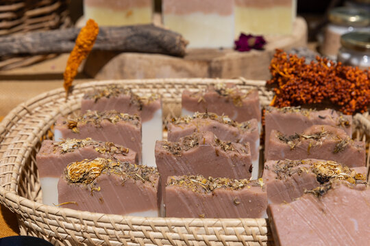 handmade artisanal soaps at a street fair in lisbon, portugal