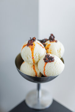 Delicious Ice Cream Scoops with Toppings in Elegant Bowl