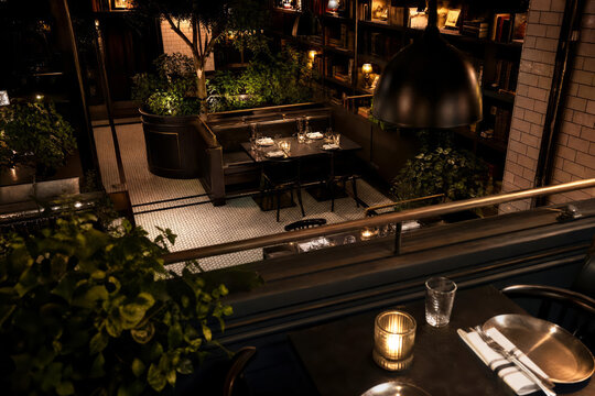 Contemporary Cafe Dining Candlelit Library Bistro With Bright Interiors And Clean Ceramics